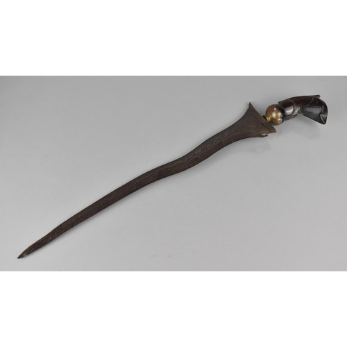 120 - A Malayan Kris with Wavy Pamir Blade and Horn Garuda Hilt with Brass Cup Ferrule, 45cm long max and ... 