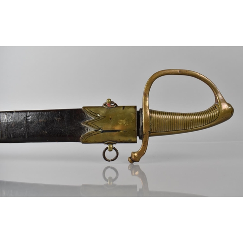 134 - A French 1819 Pattern Briquet Short Sword having Ribbed Brass Grip and Slightly Curved Blade. Brass ... 