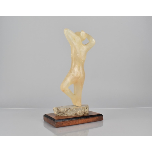 75 - An Early 20th Century Carved Calcite Figure of a Female Nude, Mounted on Mahogany Plinth, 25cms High