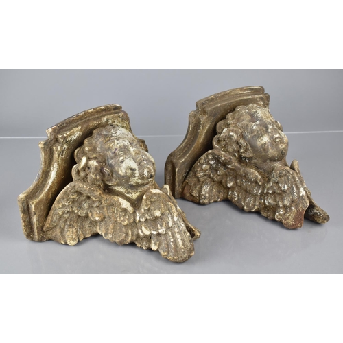 78 - A Pair of 20th Century Lead Plaster Cast Corbels Modelled as Baroque Winged Cherubs 13x22x21cms High