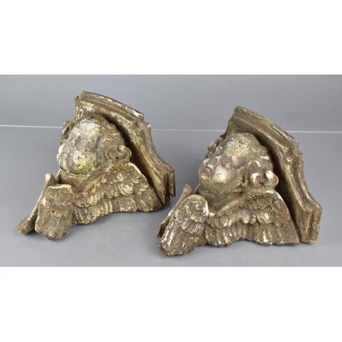 78 - A Pair of 20th Century Lead Plaster Cast Corbels Modelled as Baroque Winged Cherubs 13x22x21cms High