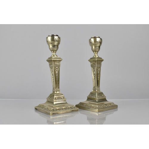 198 - A Pair of White Metal Neo-Classical Candlesticks with Iron Loaded Bases, 20cms High