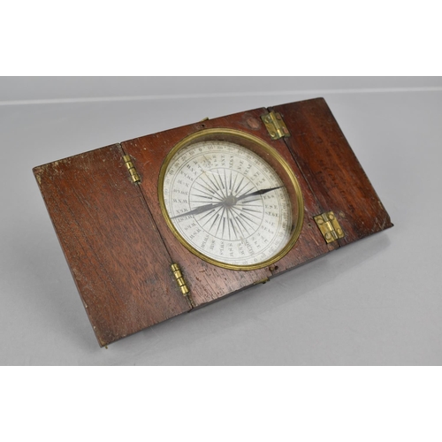 42 - A 19th Century Mahogany and Brass Cased Navigation Compass, the Case with Twin Hinged Covers and One... 