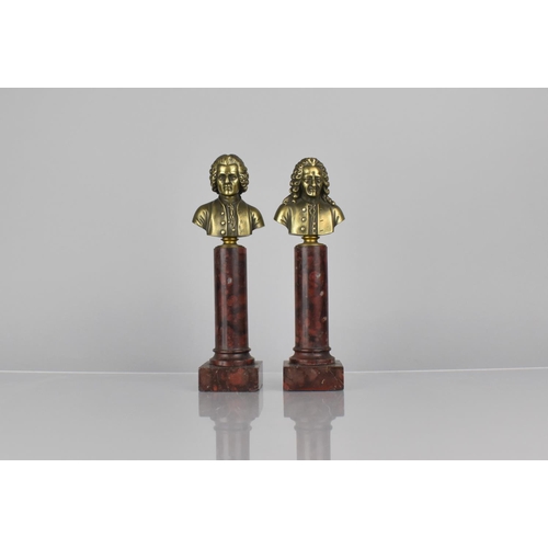 179 - A Pair of French Bronze Busts of Moliere and Rousseau supported on Red Marble Columns with Square Ba... 