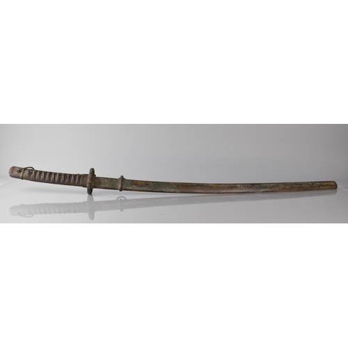 139 - A Japanese WWII Katana, The Blade Numbered 5333 Having Brass Sleeve and with Bound Shagreen Grip. St... 