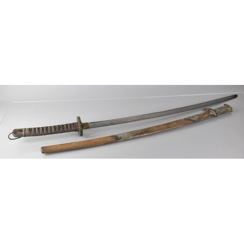 139 - A Japanese WWII Katana, The Blade Numbered 5333 Having Brass Sleeve and with Bound Shagreen Grip. St... 