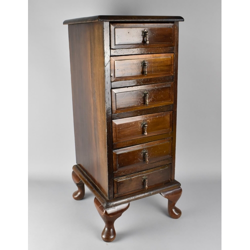 57 - An Early 20th Century Walnut Collectors Chest with Six Chamfered Front Drawers, Supported on Short C... 