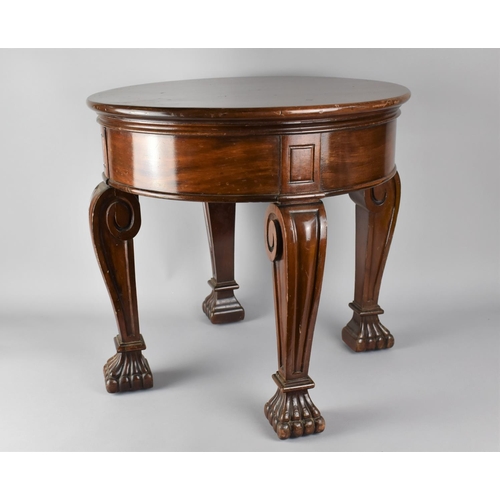 490 - An Early 20th Century Low Drum table with a Solid Top Supported on Stylised Cabriole Legs and Claw F... 