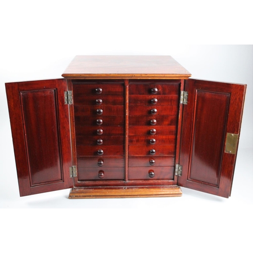 72 - A 19th Century Mahogany Table Top Collectors Chest with Two Banks of Nine Drawers Behind Panelled Do... 