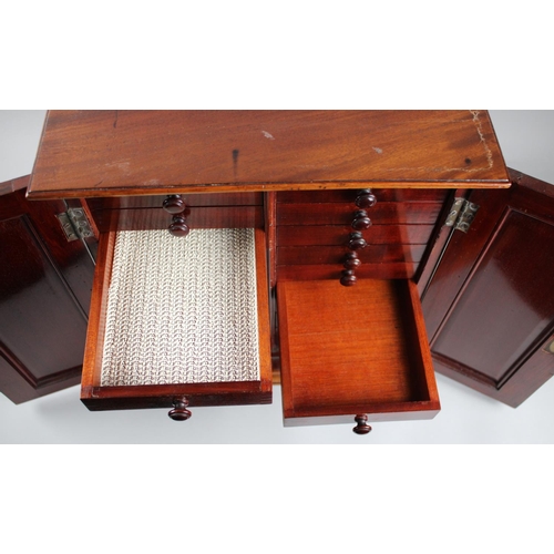 72 - A 19th Century Mahogany Table Top Collectors Chest with Two Banks of Nine Drawers Behind Panelled Do... 