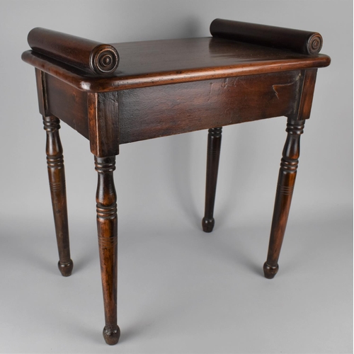 97 - A 19th Century Mahogany Hall Bench or Window Seat with Turned Bolsters on a Solid Top, Supported on ... 