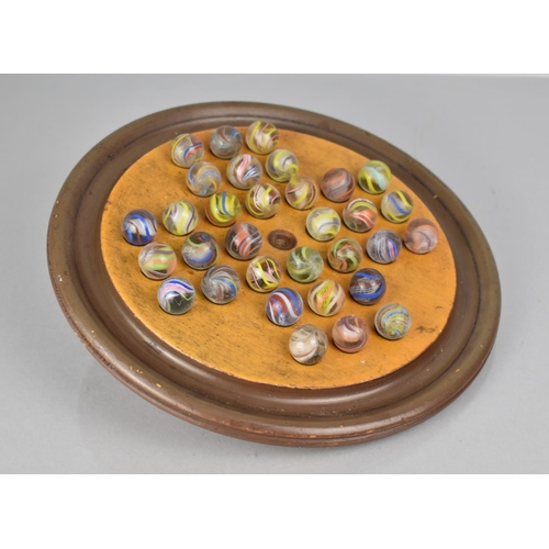 80 - A Turned Wooden Solitaire Board Housing 32 19th Century German Latticino Marbles, Board 23cms Diamet... 