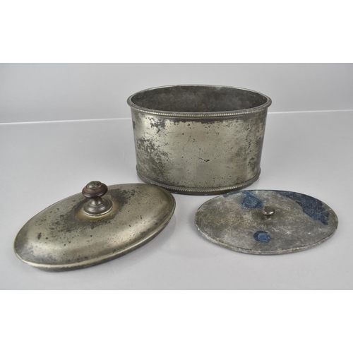 193 - An Early Continental Oval Pewter Lidded Tobacco Box with Inner Lead Weight or Press, 15cms Wide