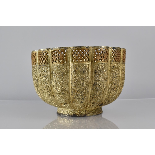 196 - A Middle Eastern Metal Bowl of Lobed Form, Each Side Decorated with Repousse Floral Design and with ... 