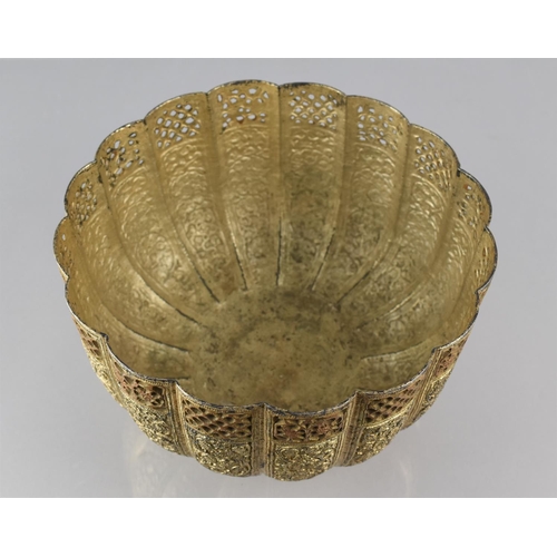 196 - A Middle Eastern Metal Bowl of Lobed Form, Each Side Decorated with Repousse Floral Design and with ... 