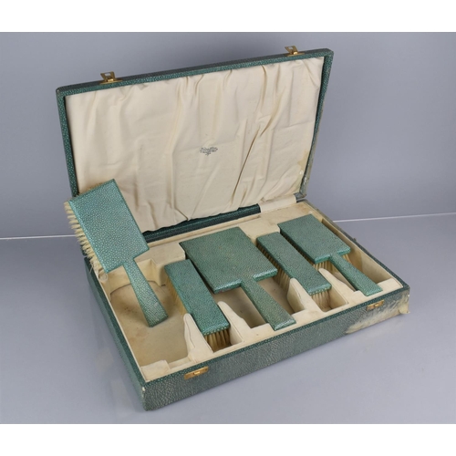 209 - An Art Deco cased Shagreen Dressing Table Set with Pair of Hair Brushes, Pair Clothes Brushes and a ... 