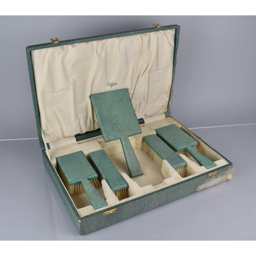 209 - An Art Deco cased Shagreen Dressing Table Set with Pair of Hair Brushes, Pair Clothes Brushes and a ... 