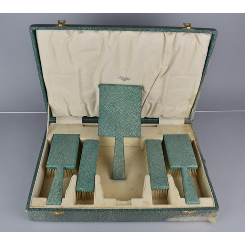 209 - An Art Deco cased Shagreen Dressing Table Set with Pair of Hair Brushes, Pair Clothes Brushes and a ... 