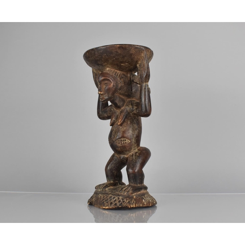 149 - A West African Figural Stool, 28cms High