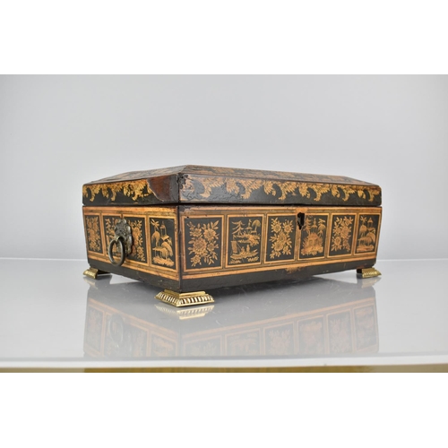 17 - A 19th Century Lacquered Chinoiserie Work Box with Ormolu Bracket Feet, Hinged Lid to Removable Tray... 