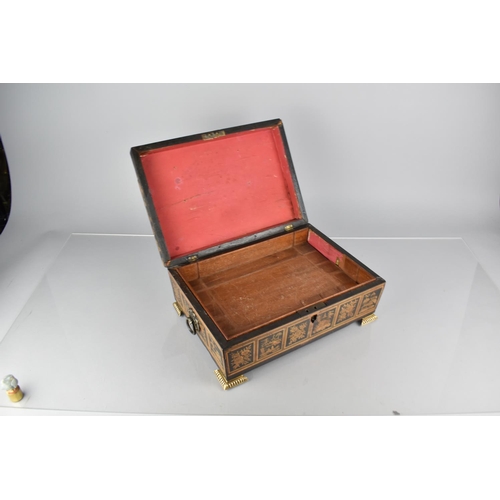 17 - A 19th Century Lacquered Chinoiserie Work Box with Ormolu Bracket Feet, Hinged Lid to Removable Tray... 