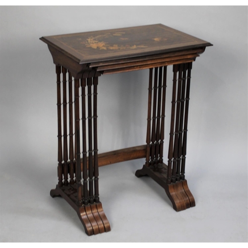 158 - A Rosewood Quartetto Nest of Four Tables with Turned Spindle Supports and Inlaid Tops