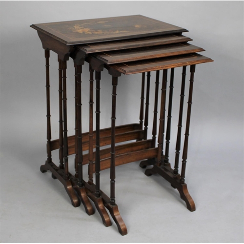 158 - A Rosewood Quartetto Nest of Four Tables with Turned Spindle Supports and Inlaid Tops