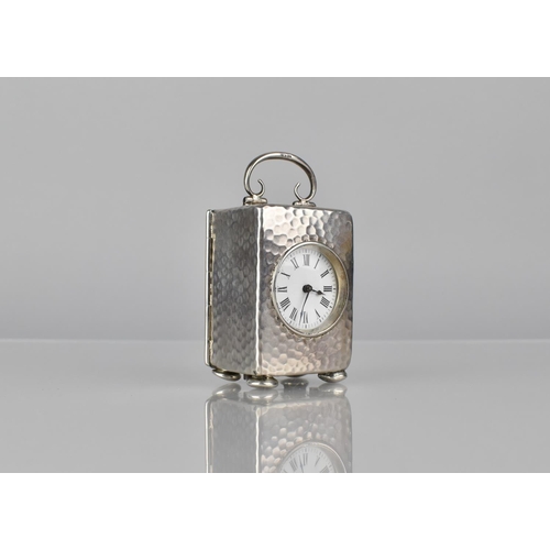 233 - A Victorian Silver Miniature Carriage Clock, Birmingham 1900, The Case of Hammered Form with White E... 