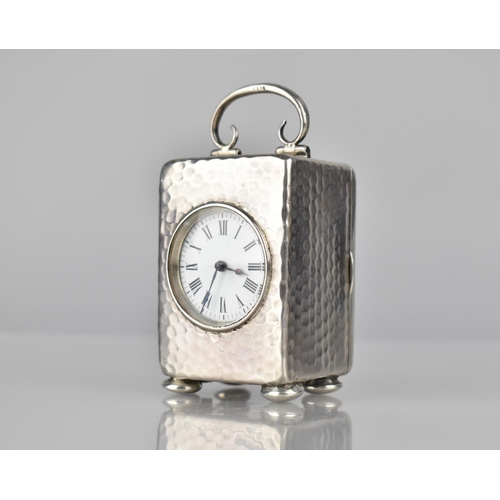 233 - A Victorian Silver Miniature Carriage Clock, Birmingham 1900, The Case of Hammered Form with White E... 