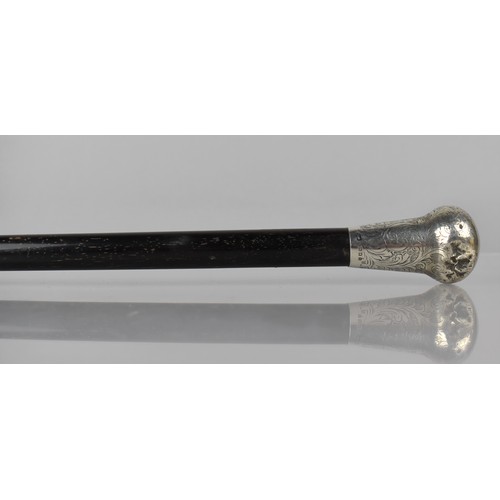 170 - An Ebonized Silver Topped Walking Cane, London 1921, 87cms Long, Impact Damage to Silver Top