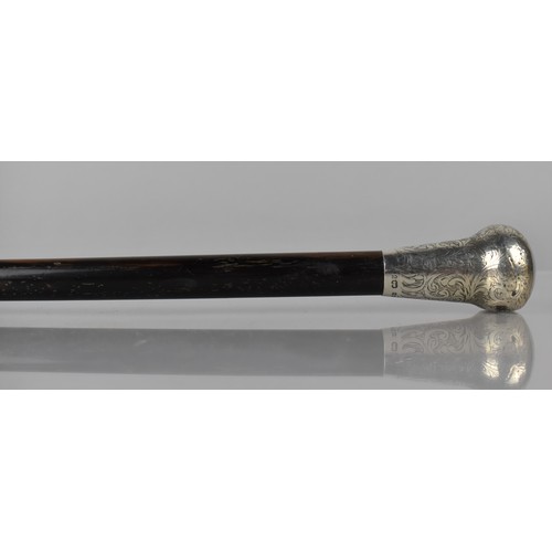 170 - An Ebonized Silver Topped Walking Cane, London 1921, 87cms Long, Impact Damage to Silver Top