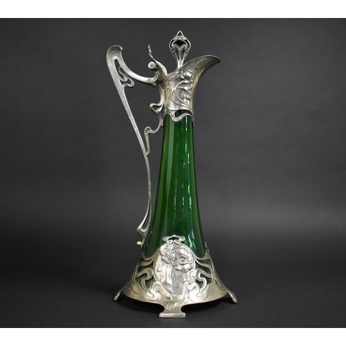 163 - A WMF Art Nouveau Green Glass and Pewter Claret Jug Designed After Albert Meyer c.1900, the Tapering... 