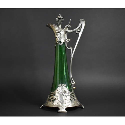 163 - A WMF Art Nouveau Green Glass and Pewter Claret Jug Designed After Albert Meyer c.1900, the Tapering... 