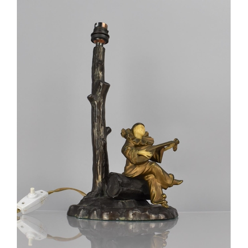 184 - After Chiparus, A Bronze Figural Table Lamp Base in the form of Clown Playing Lute Under Tree, 34cms... 