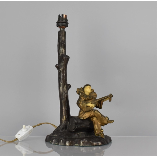 184 - After Chiparus, A Bronze Figural Table Lamp Base in the form of Clown Playing Lute Under Tree, 34cms... 