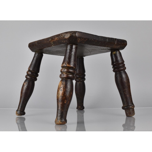 202 - An Early Oak Rustic Four Legged Stool with Peg Joints, 26cms Square and 25cms High