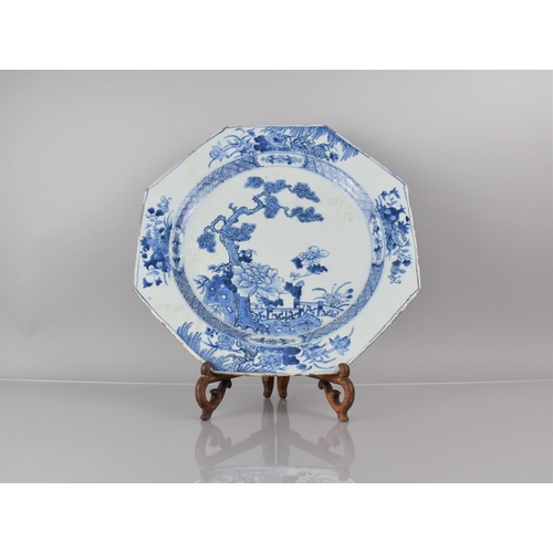 379 - A Large 18th Century Chinese Blue and White Octagonal Charger decorated with Garden Setting Featurin... 