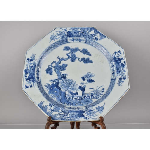 379 - A Large 18th Century Chinese Blue and White Octagonal Charger decorated with Garden Setting Featurin... 