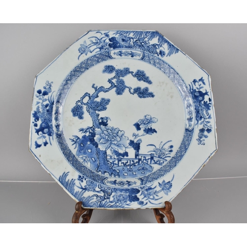 379 - A Large 18th Century Chinese Blue and White Octagonal Charger decorated with Garden Setting Featurin... 