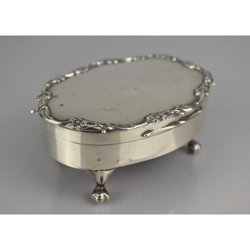 237 - An Oval Silver Dressing Table Top Jewellery Box on Four Claw Feet, Hinged Lid to Padded Interior, 11... 