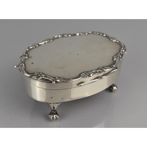 237 - An Oval Silver Dressing Table Top Jewellery Box on Four Claw Feet, Hinged Lid to Padded Interior, 11... 