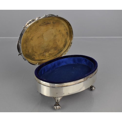 237 - An Oval Silver Dressing Table Top Jewellery Box on Four Claw Feet, Hinged Lid to Padded Interior, 11... 