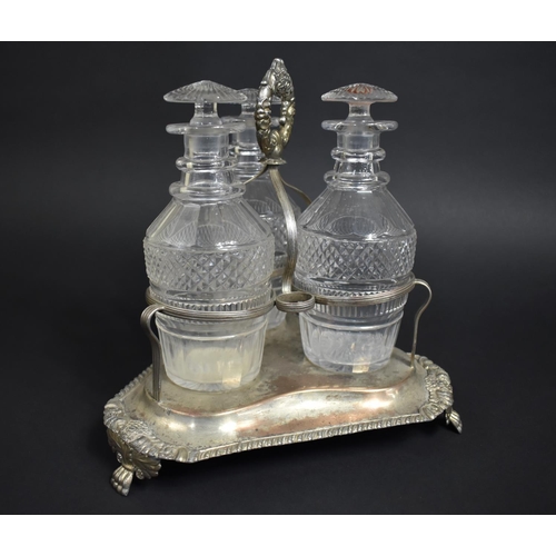 257 - A Georgian Three Bottle Tantalus on Silver Plated Stand, Glass Bottles of Mallet Form having Cut Hob... 