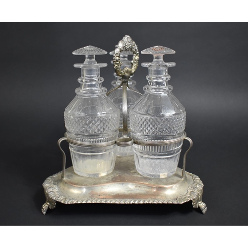 257 - A Georgian Three Bottle Tantalus on Silver Plated Stand, Glass Bottles of Mallet Form having Cut Hob... 