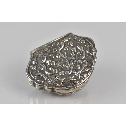 244 - An Early 19th Century Silver Snuff Box with Repousse Decoration, 7cms Wide