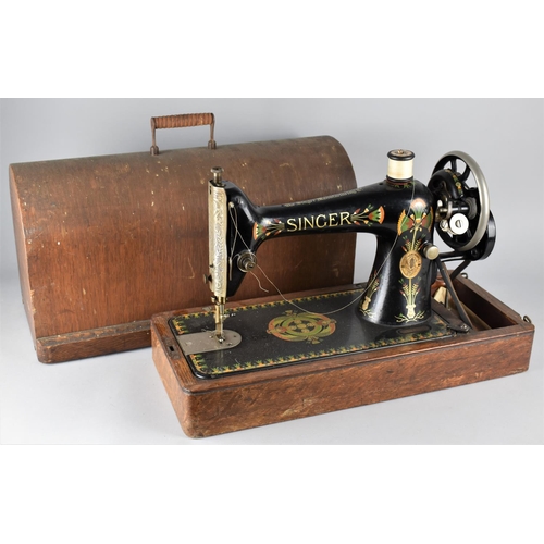 467 - An Early 20th Century Manual Singer Sewing Machine in Oak Case, Serial Number Y1016527