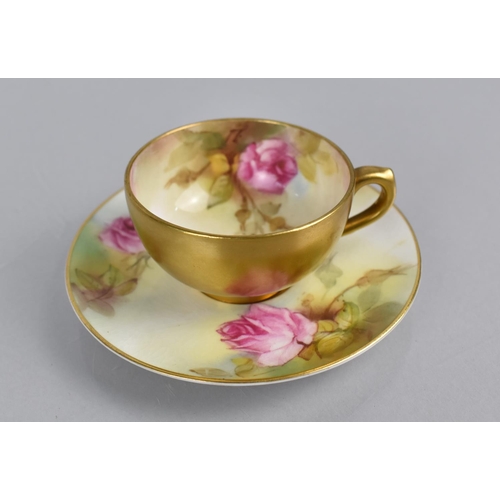 276 - A Hand Painted Royal Worcester Miniature Cup and Saucer, Roses, Gilt Body and Trim. Condition:Appear... 