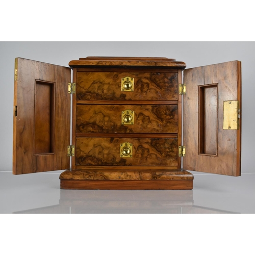 10 - A 19th Century Burr Walnut Table Top Collectors Chest with two Doors Opening to Reveal Three Interio... 