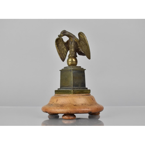 175 - A 19th Century Bronze Pocket Watch Holder in the Form of an Eagle with Wings Spread Perched on Ball ... 