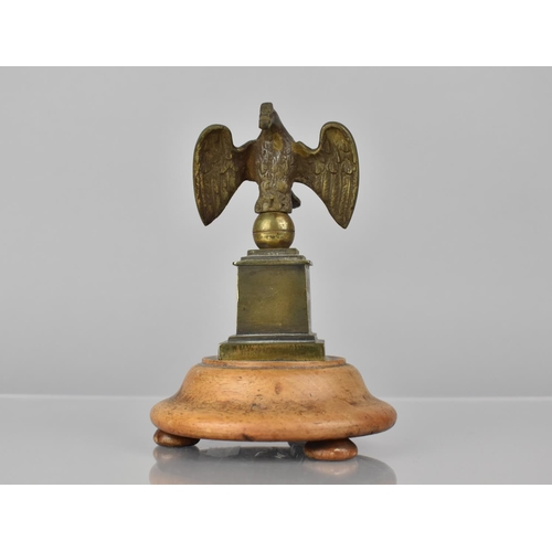 175 - A 19th Century Bronze Pocket Watch Holder in the Form of an Eagle with Wings Spread Perched on Ball ... 